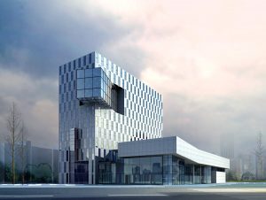 A contemporary building with a distinctive design features a tall, glass-panelled tower reminiscent of state-of-the-art data centres, with a protruding section attached to a lower structure. A cloudy sky looms in the background.