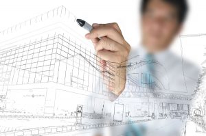 A person in a tie meticulously drafts the blueprint of a contemporary pump house on a transparent surface, their pen gliding smoothly over the design.